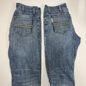 2 Pairs Of Cinch Classic White Label Boot Cut Jeans. 32x34